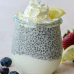 These Keto Lemon Cheesecake Parfaits feature a creamy lemon cheesecake layer topped with vanilla chia seed pudding! An easy no bake keto treat!