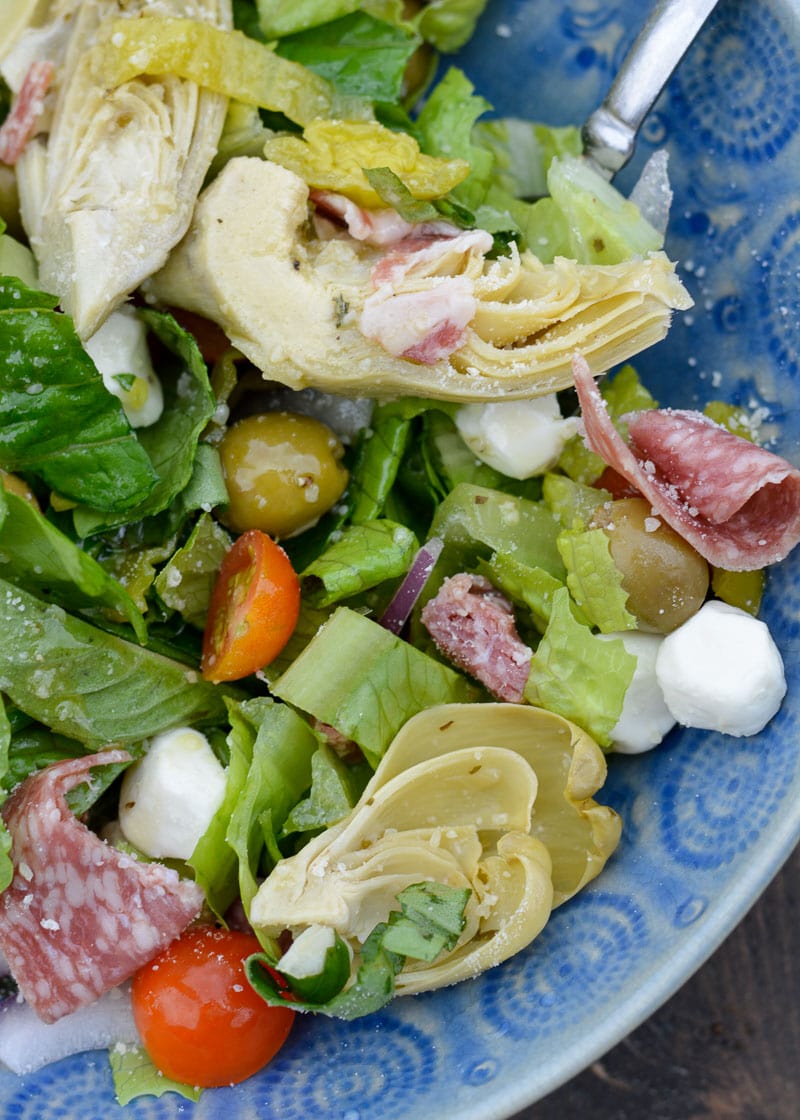 This Italian Chopped Salad is an easy no cook meal. Loaded with meat, cheese and vegetable this filling salad has fewer than 6 net carbs per serving.