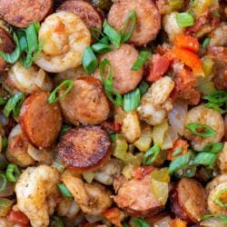 This Creole Shrimp and Sausage Skillet is the perfect 20 minute dinner recipe! This dish is packed with smoked sausage, tender shrimp, and vegetables in a buttery cajun sauce!