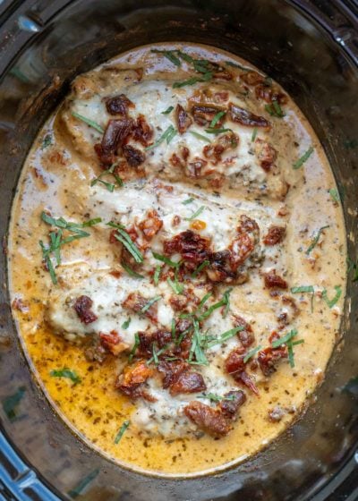 crock pot sun dried tomato chicken in a black crock pot